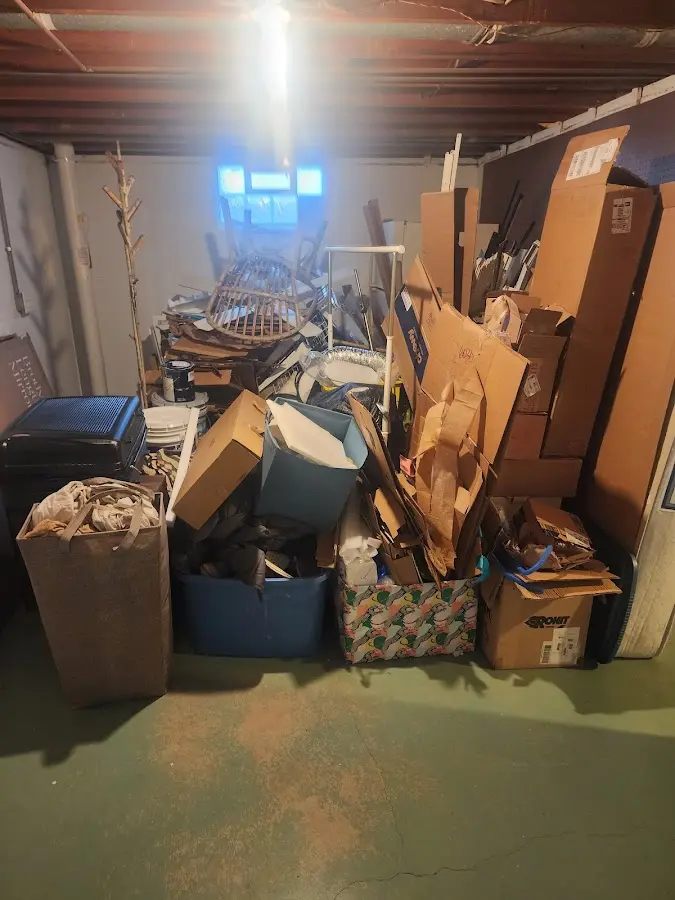 Roll-off dumpster container at job site for 2 Yard Dumpster Rental in Haiku-Pauwela